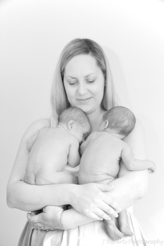 mother with newborn twins - newborn portrait photography sydney